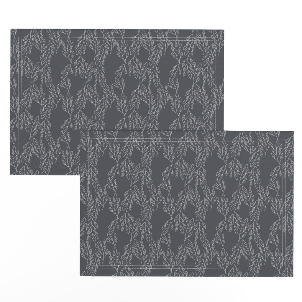 Top down of a set of two Placemats stacked and offset from eachother showing more of the printed design