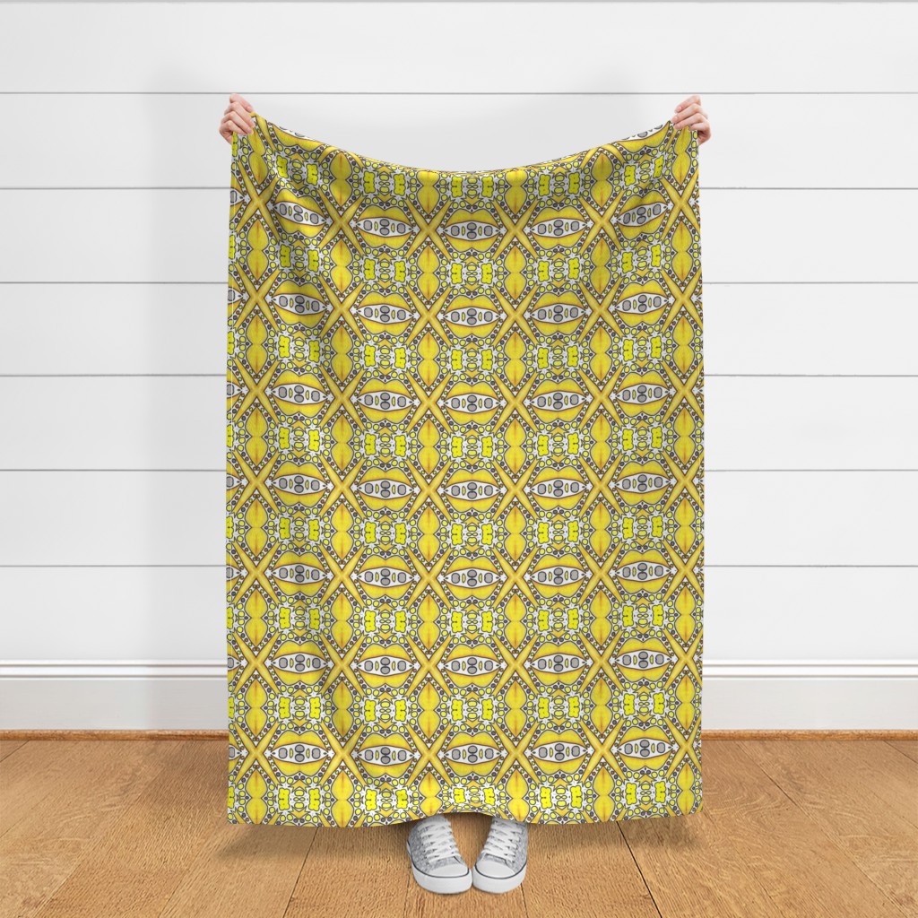 Throw blanket held up in front of a white shiplap wall