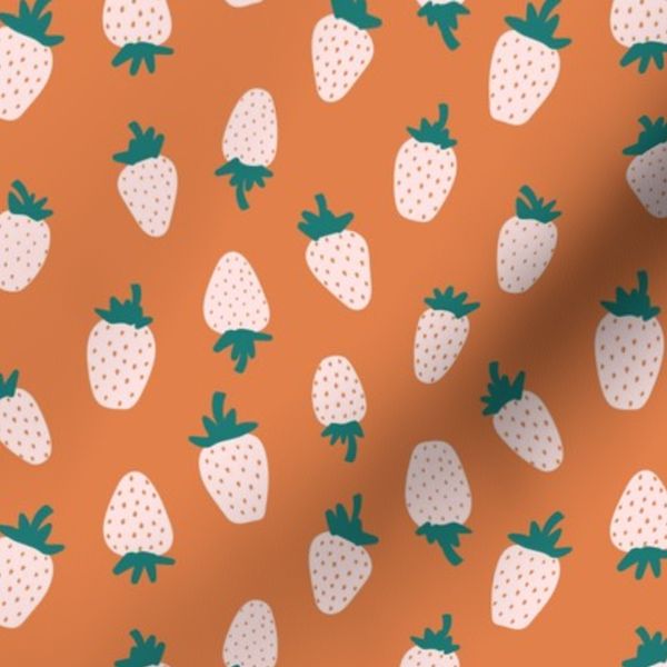 strawberries on burnt orange