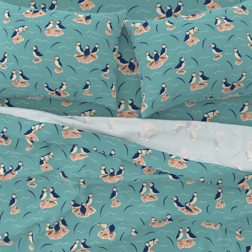 A close-up top down view of a bed with pillowcases and the top sheet pulled down slightly