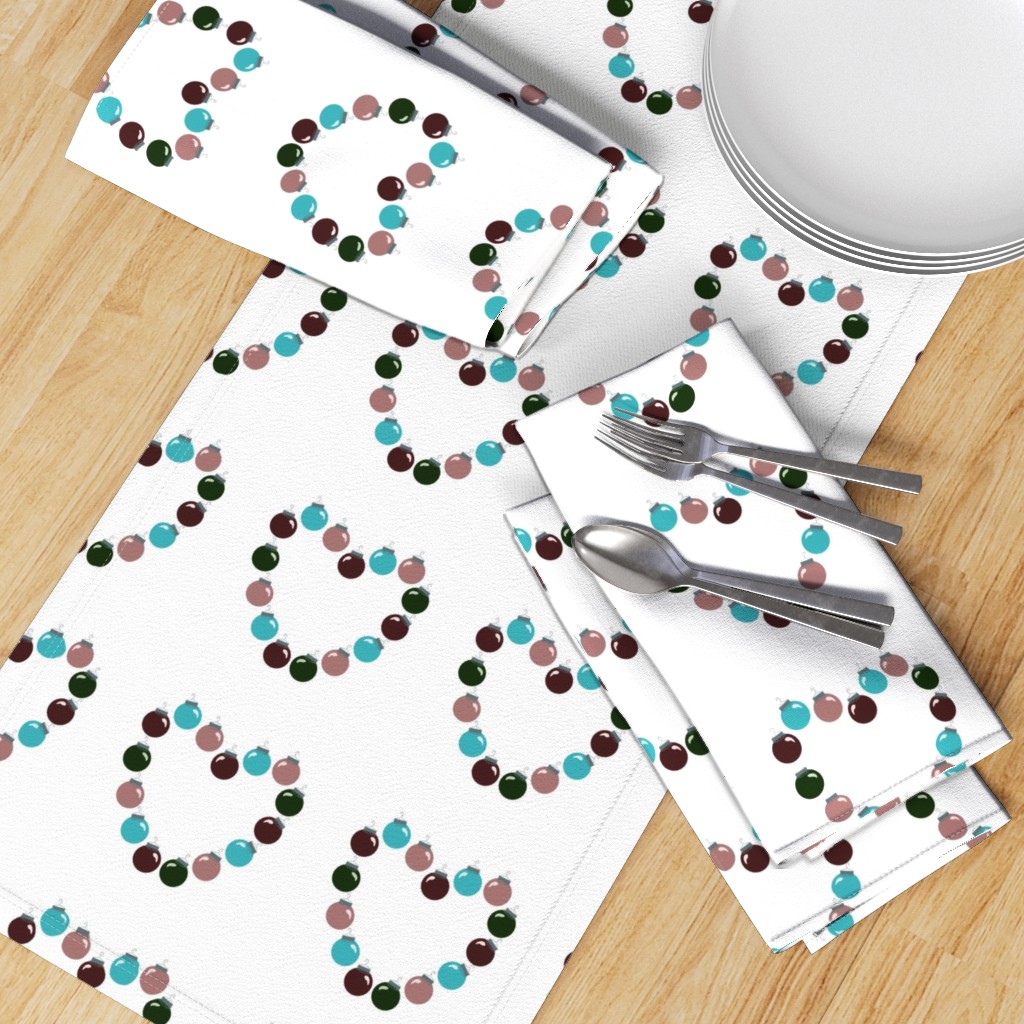 Top down table with a Table Runner placed diagonally with a set of Dinner Napkins, plates and silverware on top