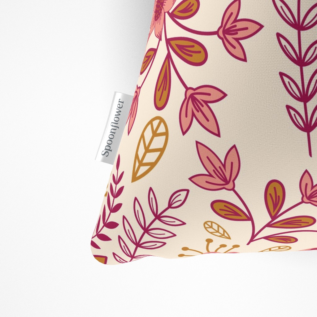Close up of the Spoonflower tag on the side seam of the Throw Pillow