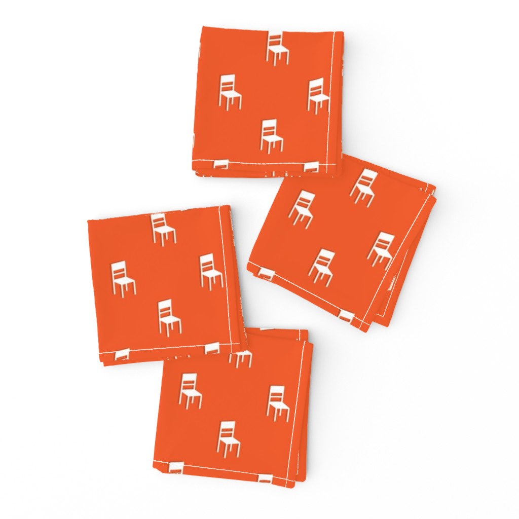 Top down of a set of four Cocktail Napkins neatly folded and arragned on a white background