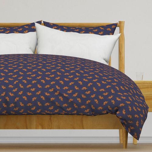 Small watercolor monarch butterflies on navy blue for kids and nursery