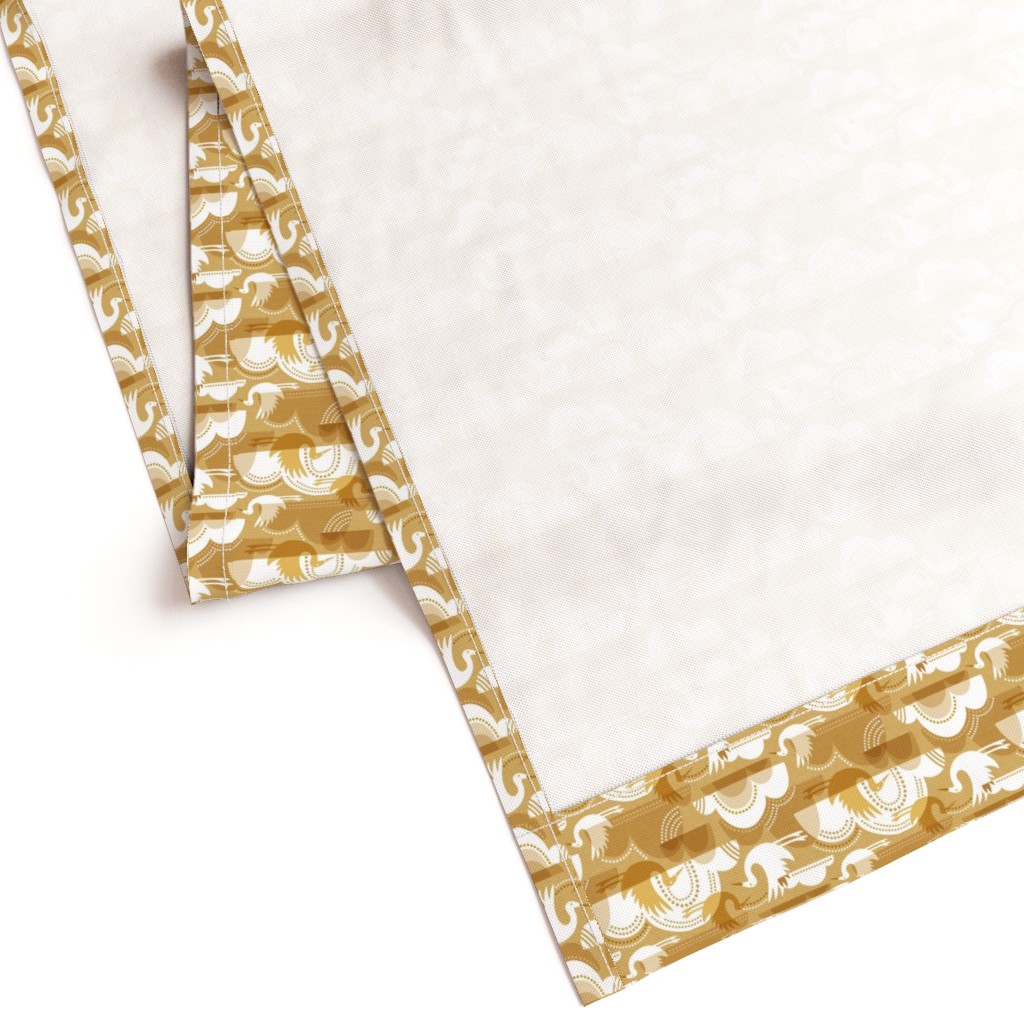 Gently folded Curtain panel laying on a white background showing the unprinted back and large bottom hem
