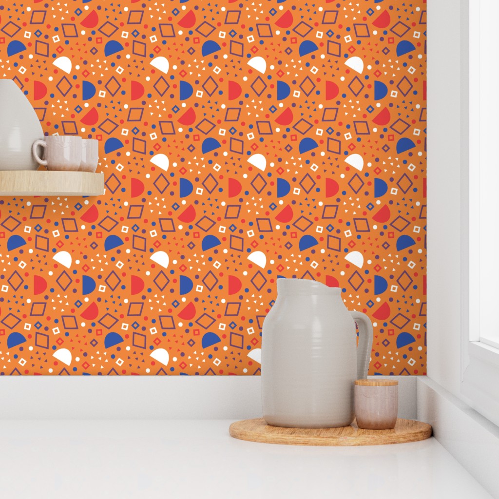 Corner of a kitchen counter with a window and shelf showing Peel and Stick wallpaper on the walls