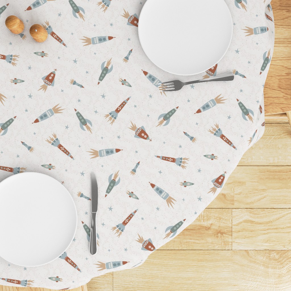 Top down edge of a round table with a Tablecloth draped on top