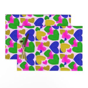 Colorful Hearts Pink Blue Green Yellow Hearts on Pink Background