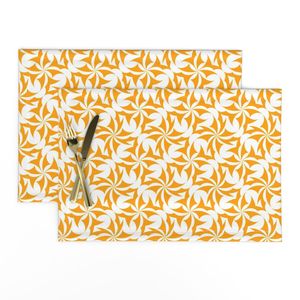 Minimalist floral pattern with orange spiral wavy triangles on a white