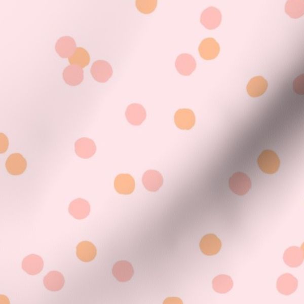 Pink and peach confetti polka dots on light pink background for girl room
