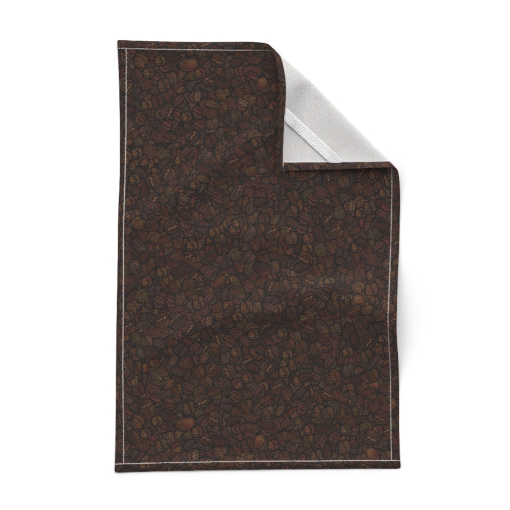 A Tea Towel laying out flat on a white background with the top right corner folded over showing the hem and unprinted backing with the white hanging tab
