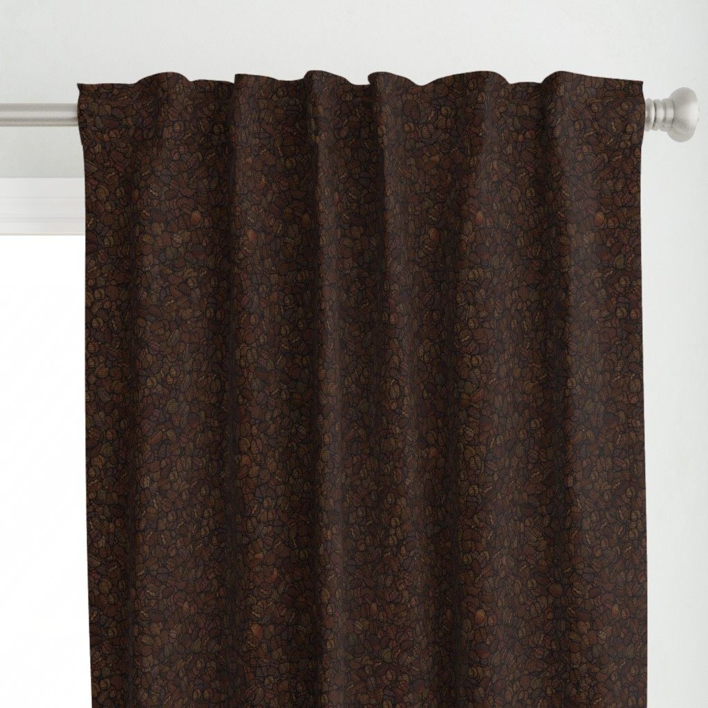 Close up of a Curtain panel hanging from a silver curtain rod in front of a window