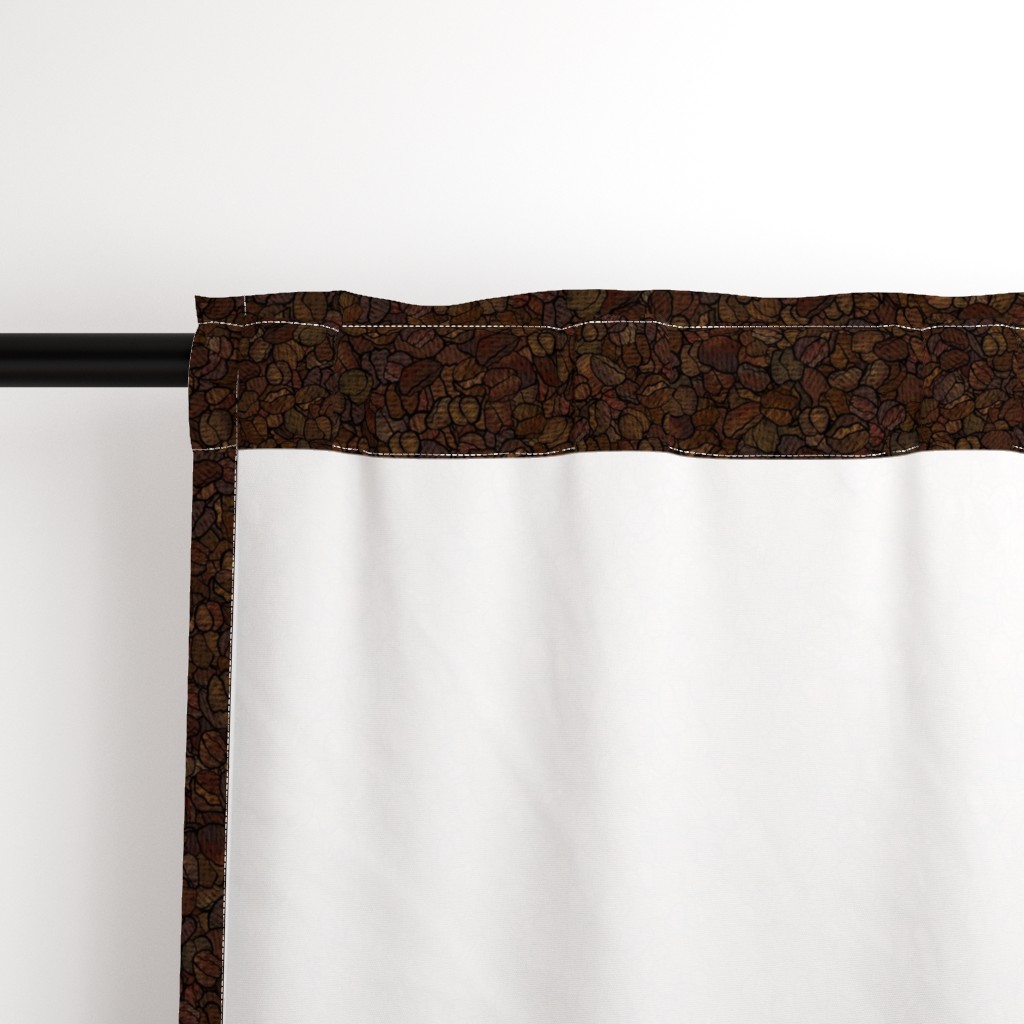 Close up of the back a Curtain panel hanging from a black curtain rod showing the rod pocket hanging option