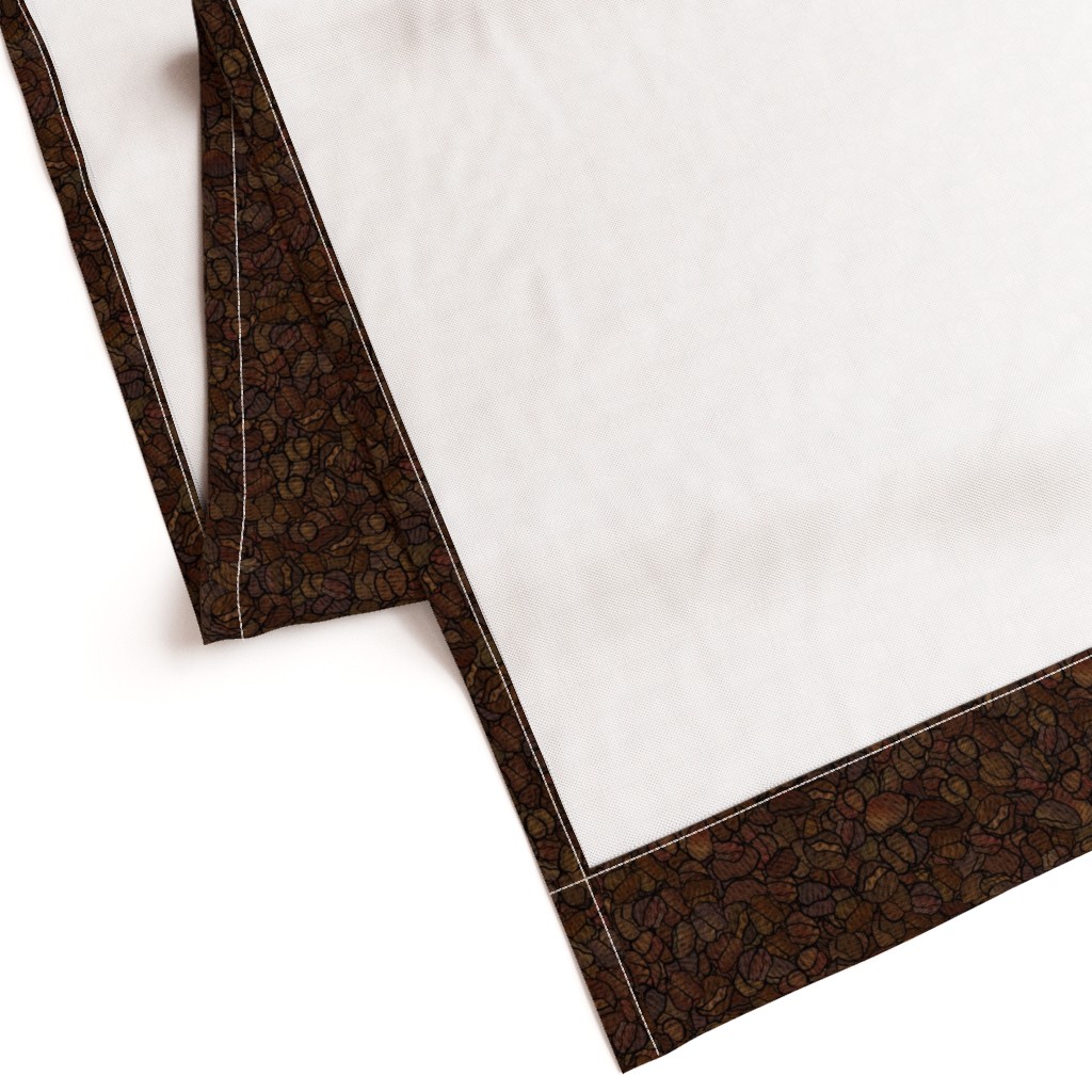 Gently folded Curtain panel laying on a white background showing the unprinted back and large bottom hem