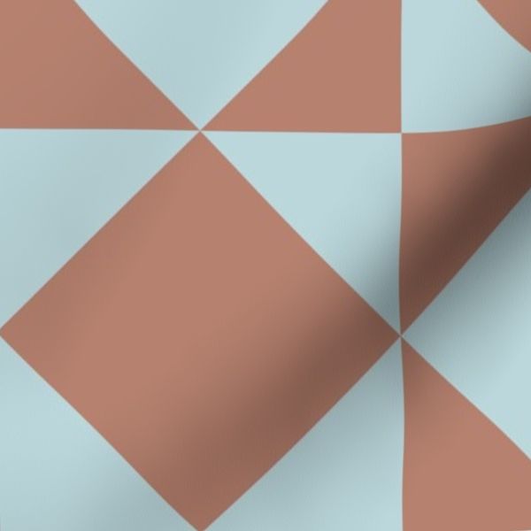 Patchwork Quilt Pattern with Geometric Triangles and Diamonds