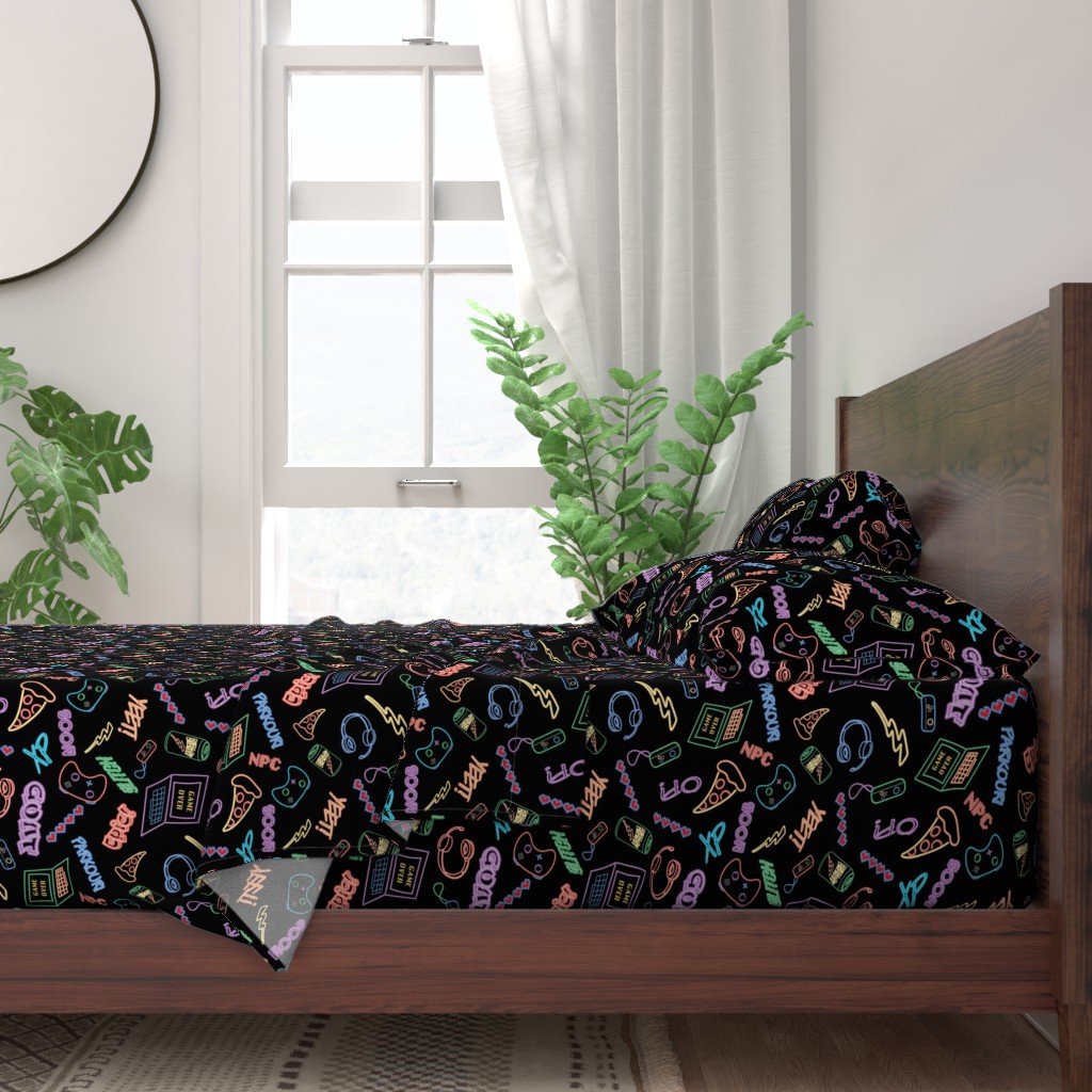 A neatly made bed with sheets and pillows with a wooden bedframe. The bed is next to a window with plants on either side and a round mirror hangs on the wall to the left of the window.