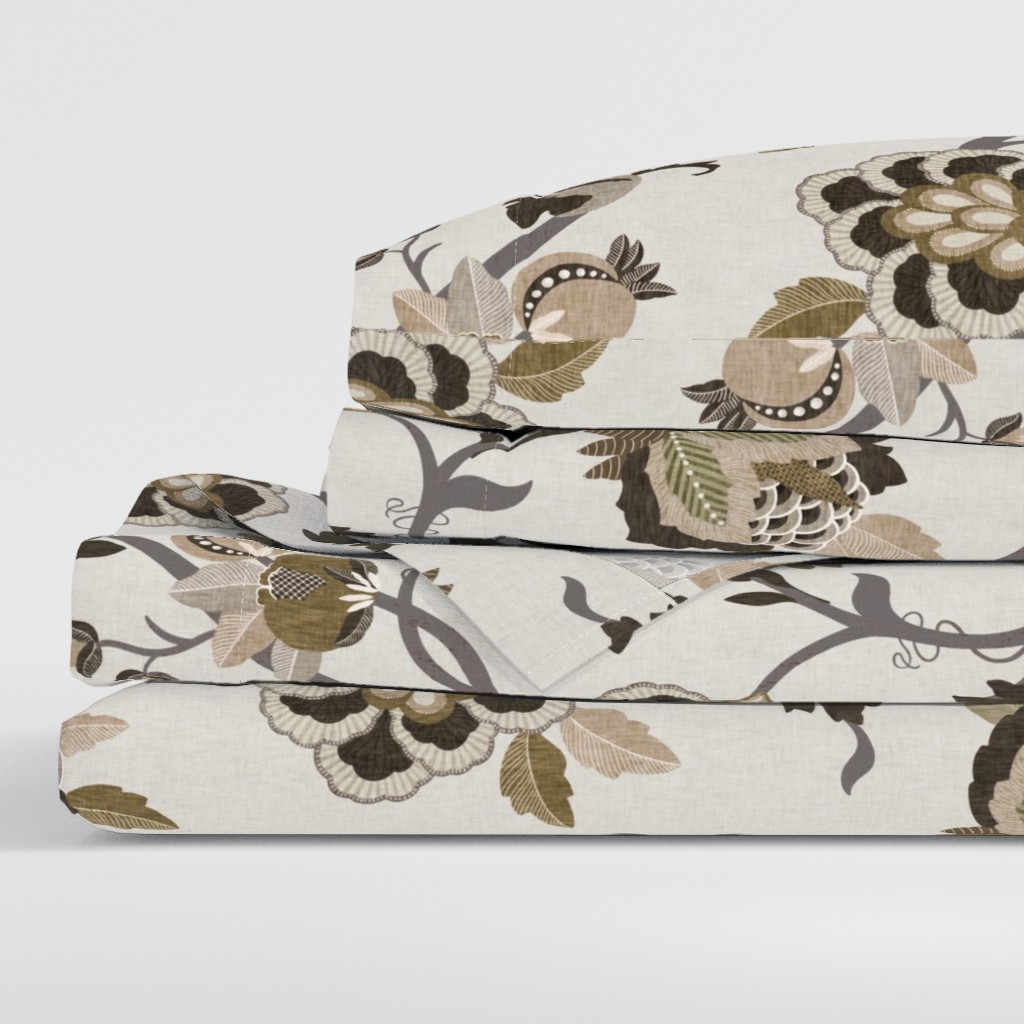 Side view of a folded stack of sheets with two pillowcases