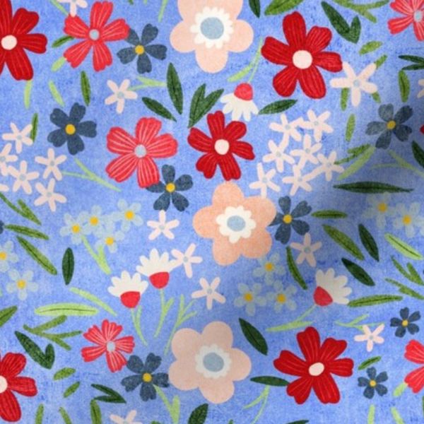 Bright Blue Wildflower Garden with Red and Peach