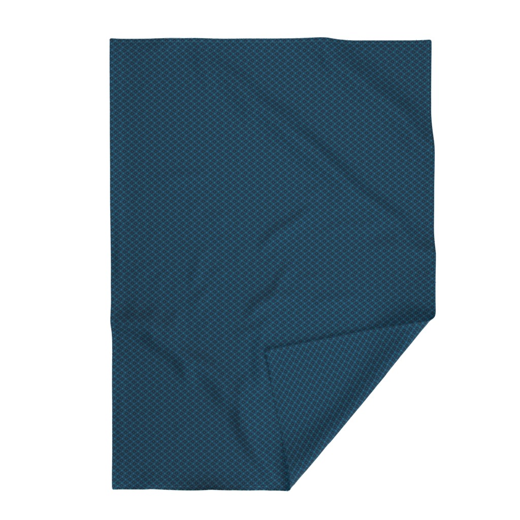 Top down Throw Blanket with the bottom right edge flipped up on a white background