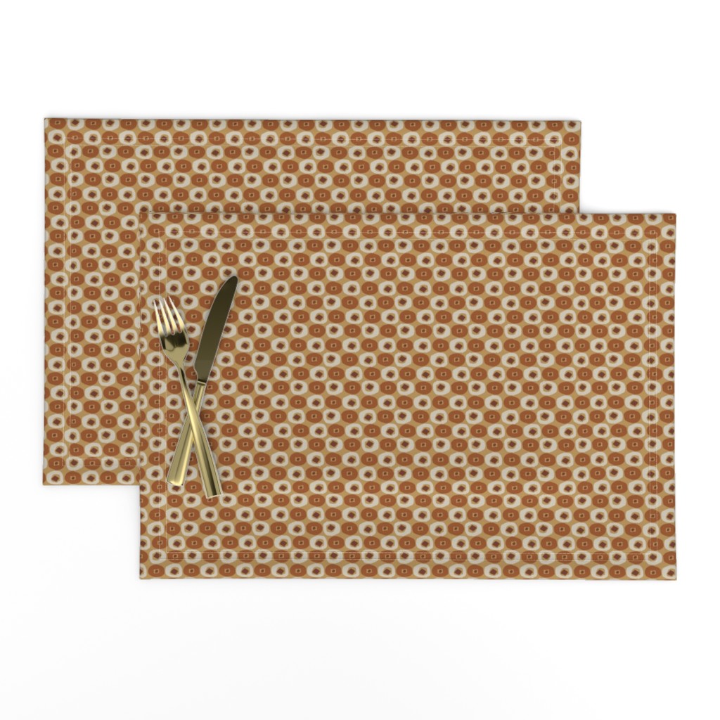 Top down of a set of two Placemats stacked and offset from eachother with a knife and fork on top