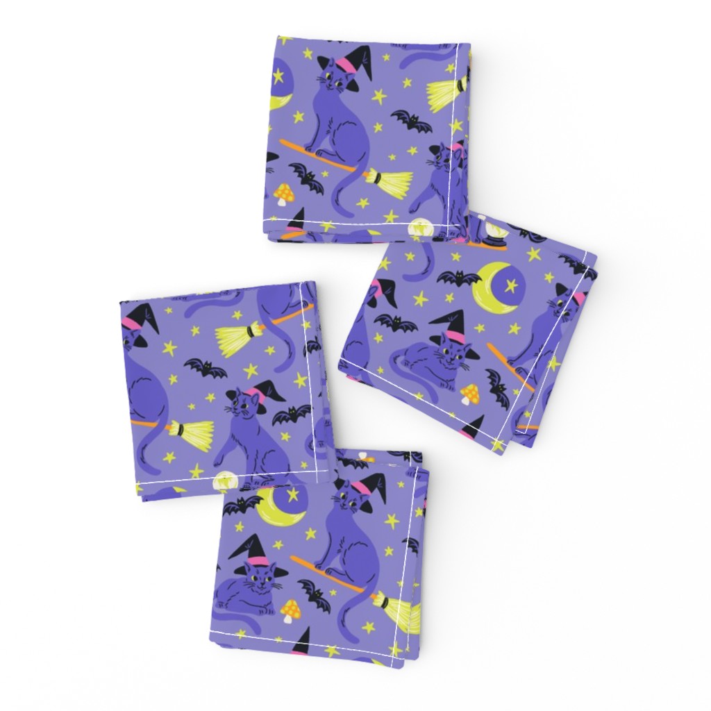 Top down of a set of four Cocktail Napkins neatly folded and arragned on a white background