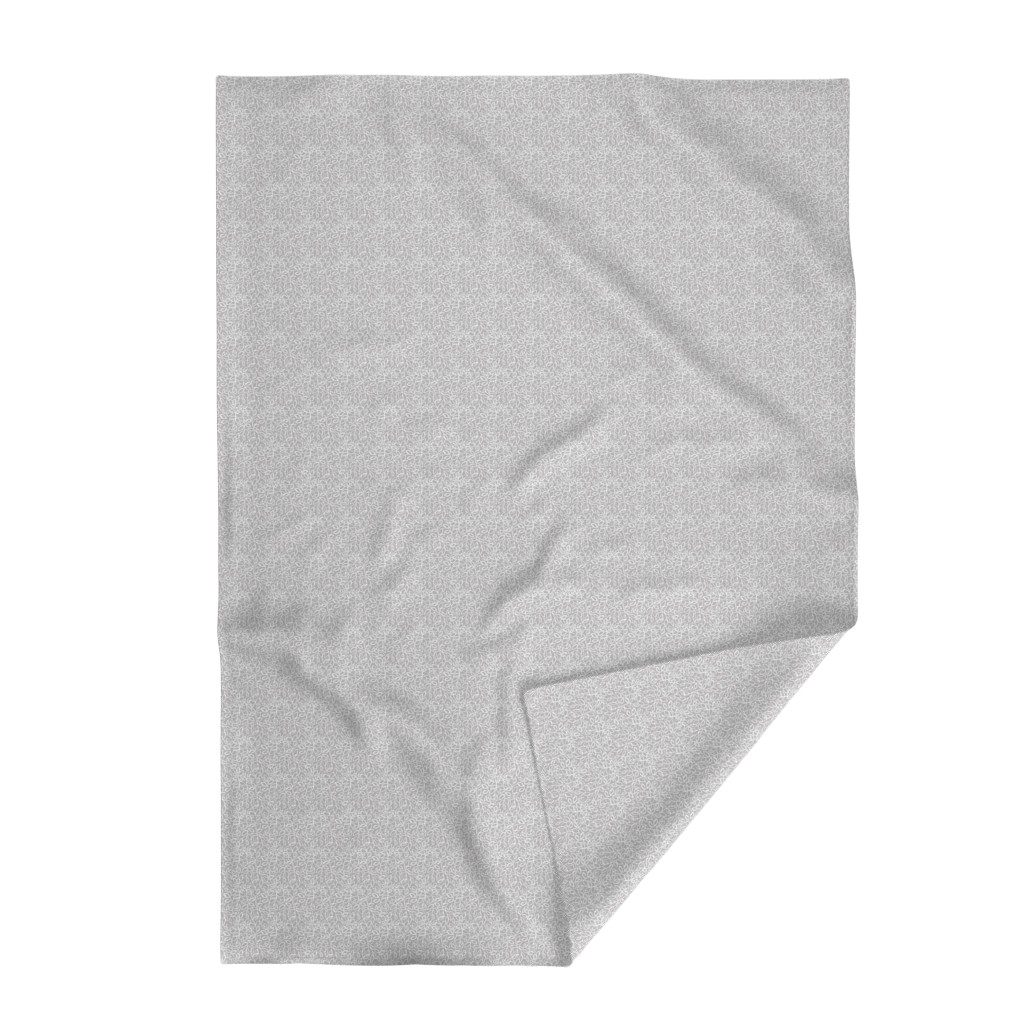 Top down Throw Blanket with the bottom right edge flipped up on a white background