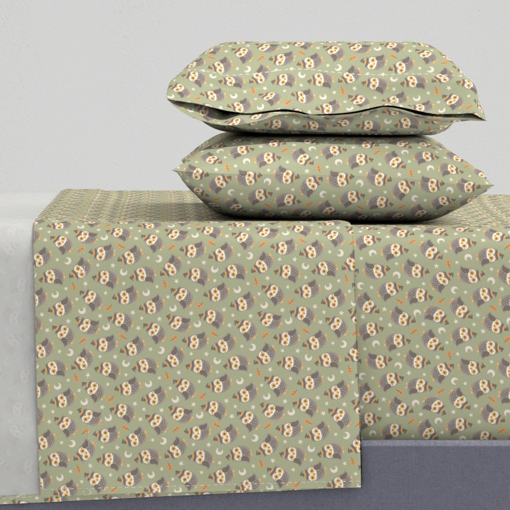 Side view of a bed with sheets and two pillowcases
