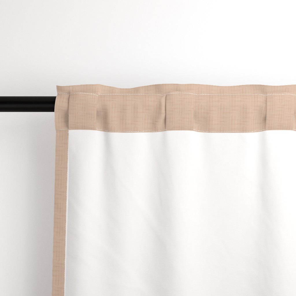 Close up of the back a Curtain panel hanging from a black curtain rod showing the rod pocket hanging option