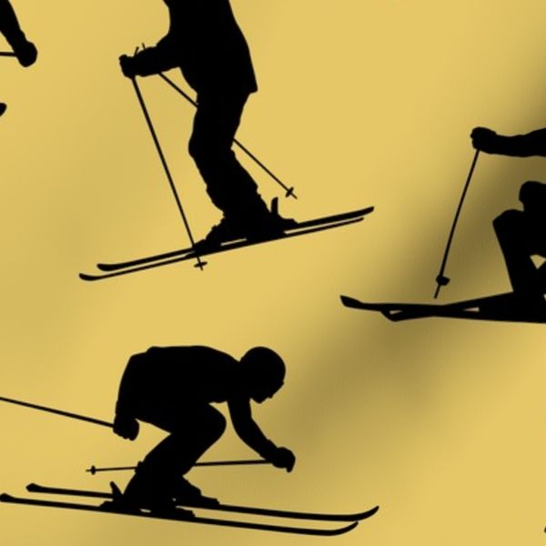 Downhill skiers in Silhouette on Yellow