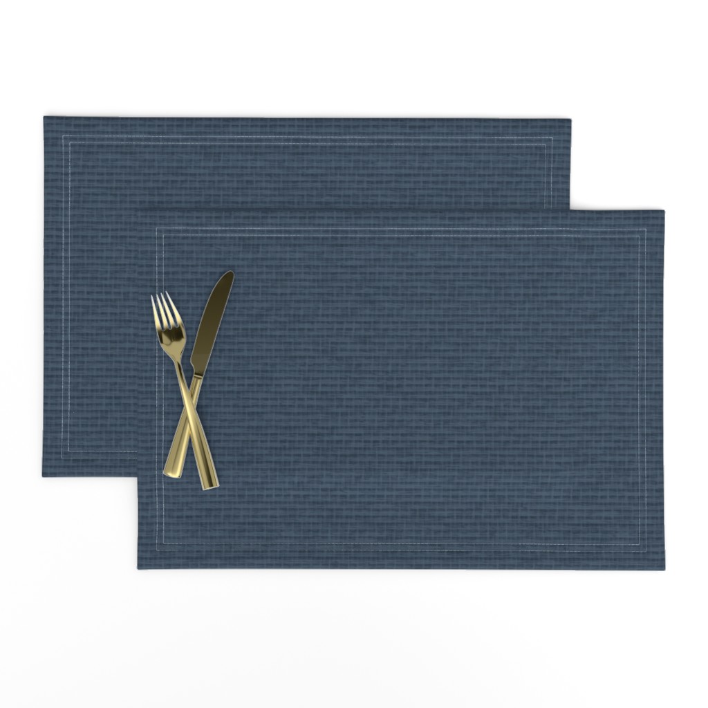Top down of a set of two Placemats stacked and offset from eachother with a knife and fork on top