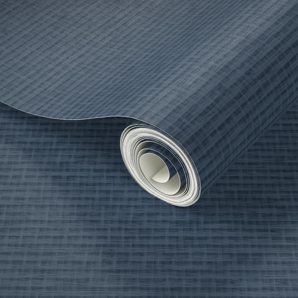 Close up of a Peel and Stick wallpaper roll with a design applied