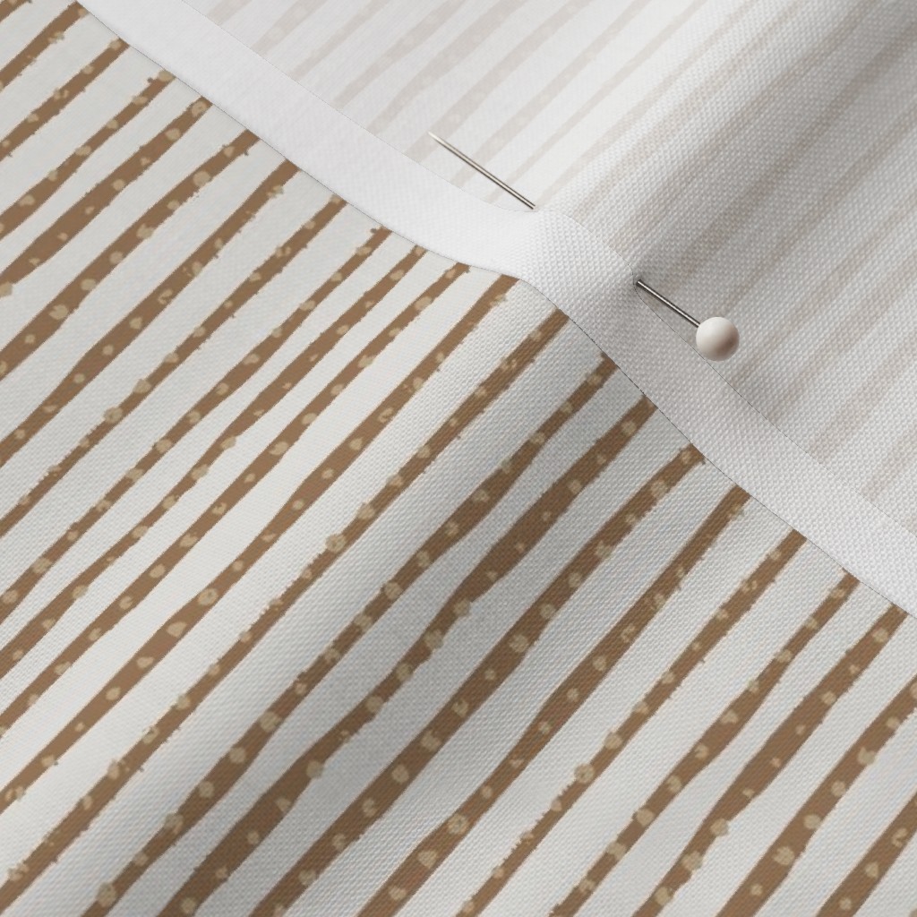Close up of Petal Signature Cotton fabric with a sewing pin