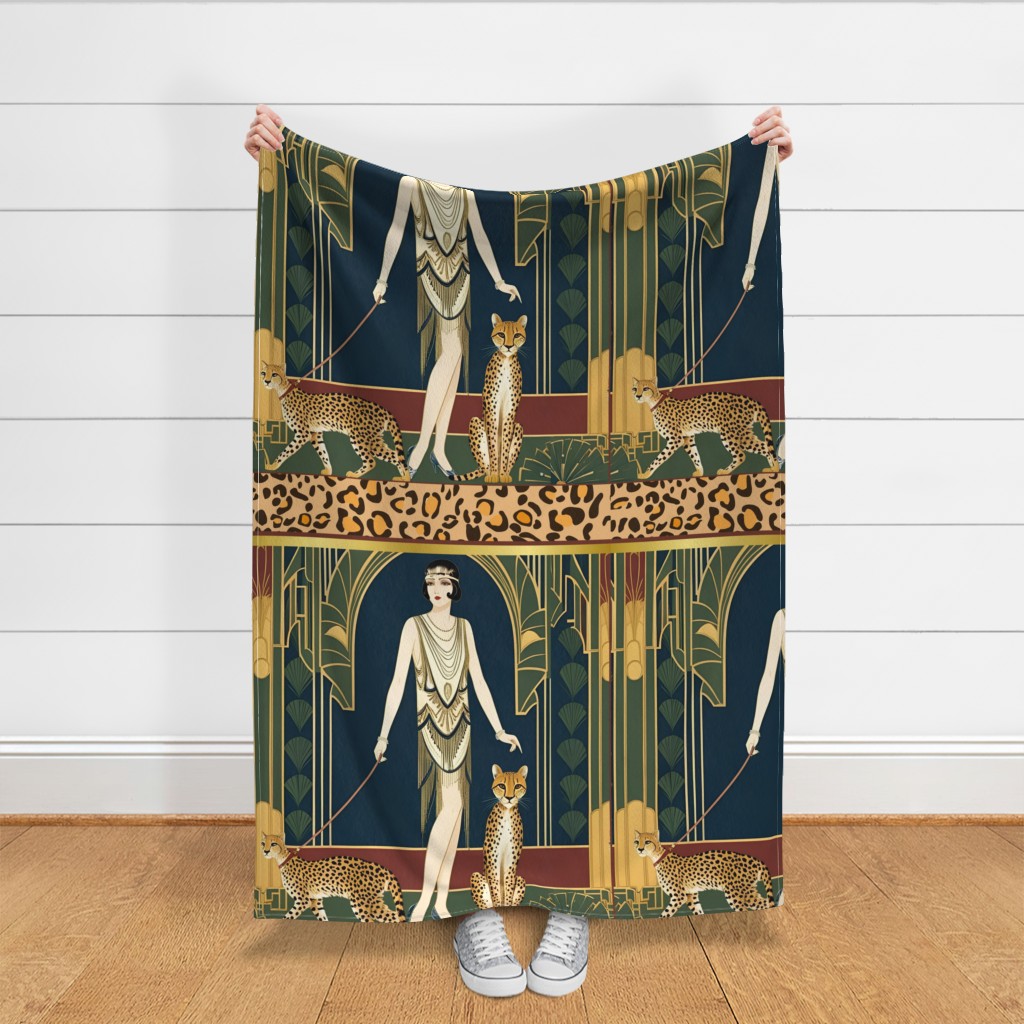 Throw blanket held up in front of a white shiplap wall
