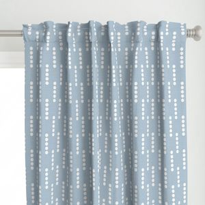 Evenly Spaced White Dots on a Calm Coastal Blue Linen Textured Background