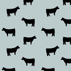 Black Heifer on Blue Gray