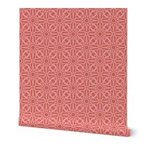 Simple geometric petunia floral and  starburst pattern in pink on deep red