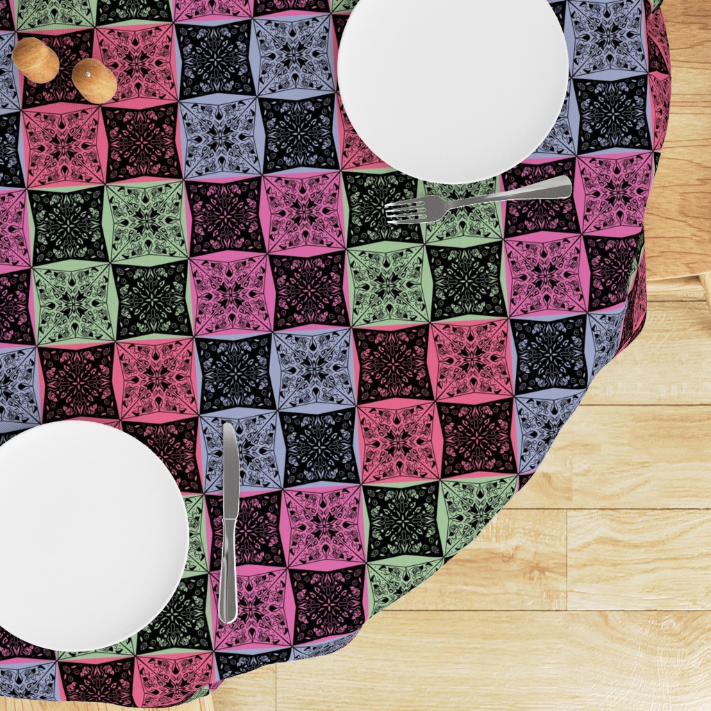 Top down edge of a round table with a Tablecloth draped on top