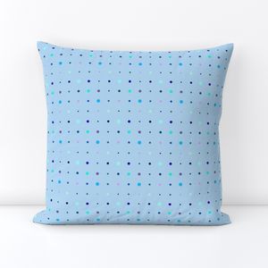Multi colored blue dot on light blue