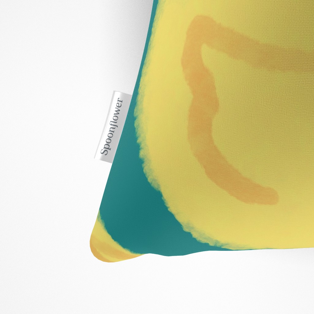 Close up of the Spoonflower tag on the side seam of the Throw Pillow