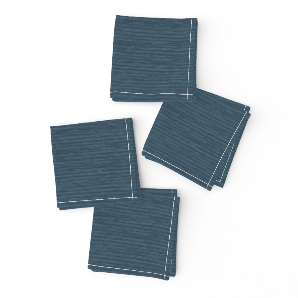 Top down of a set of four Cocktail Napkins neatly folded and arragned on a white background