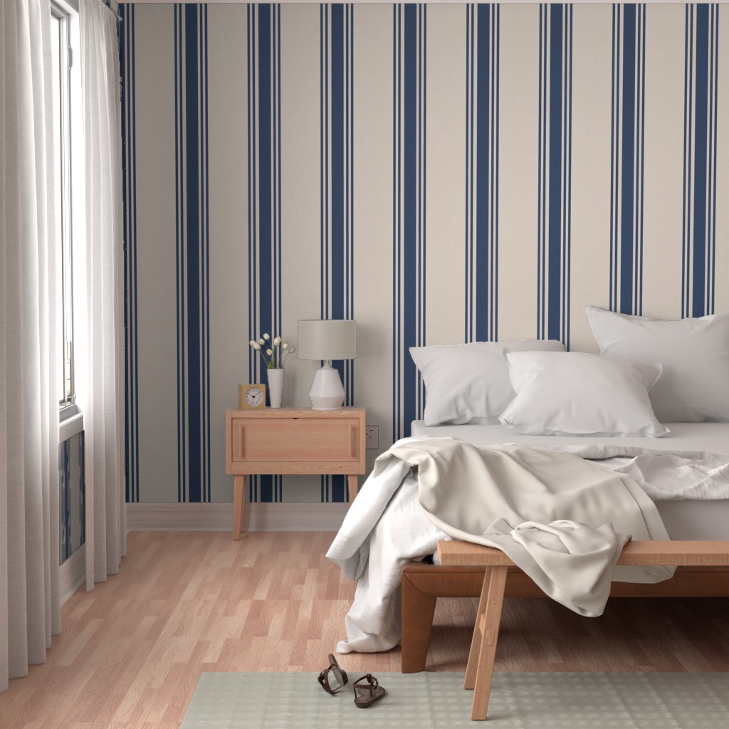 Bedroom with a bright window, bed and wood furniture with Peel and Stick wallpaper on the walls