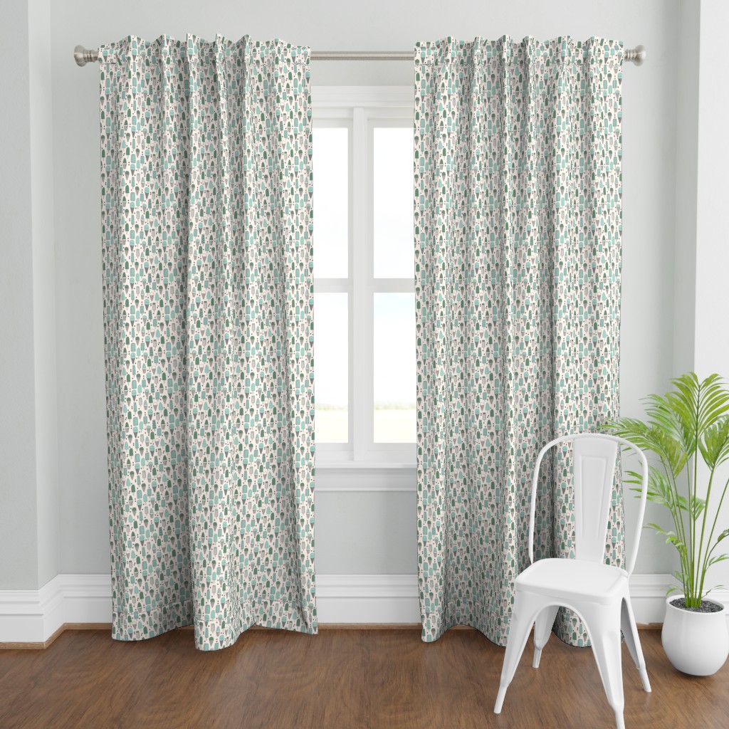 A wide shot with a two Curtain panels hanging from a curtain rod in front of an open window. A plant and a chair are in front and to the right of the right panel.