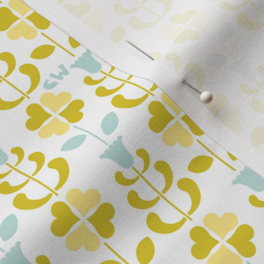 Close up of Petal Signature Cotton fabric with a sewing pin