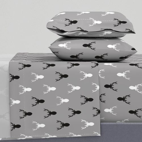 Black and White and Gray Deer