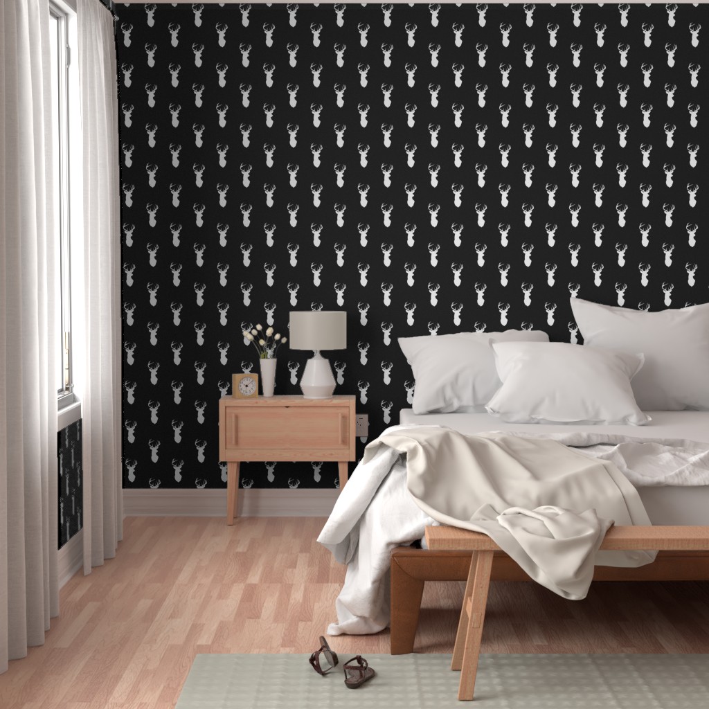 Bedroom with a bright window, bed and wood furniture with Peel and Stick wallpaper on the walls