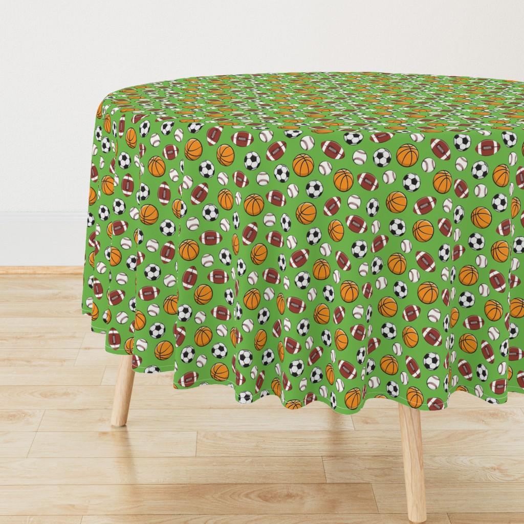 Side view of a circular wooden table with a Tablecloth draped over it, sitting on top of light wood floors