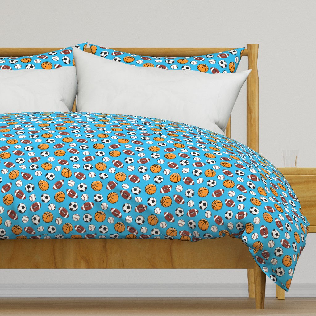 Light colored wooden bed frame with a duvet cover