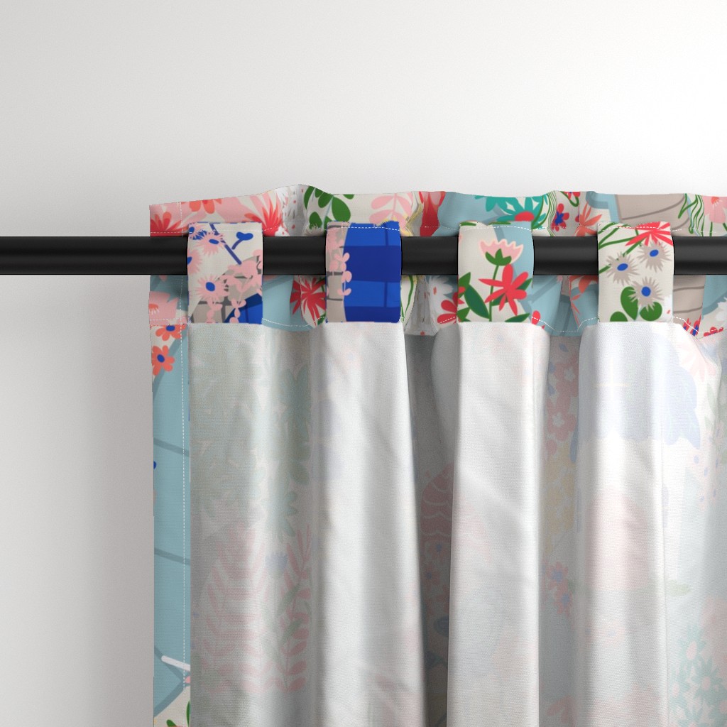 Close up of the back a Curtain panel hanging from a black curtain rod showing the tab hanging option
