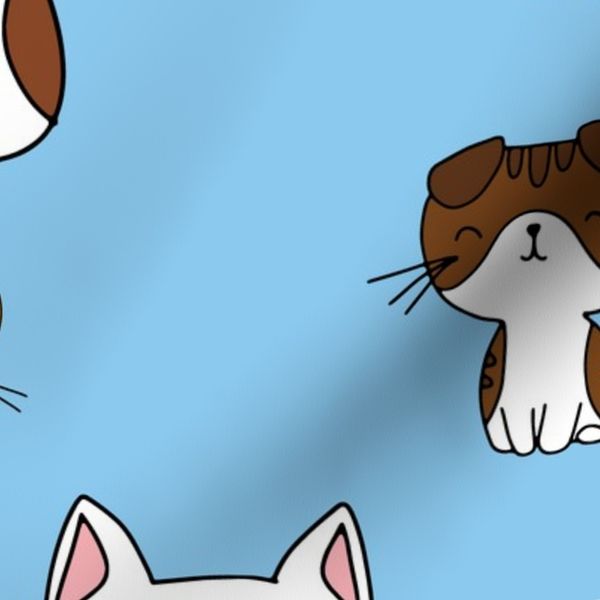 Cute hand drawn cats on blue background