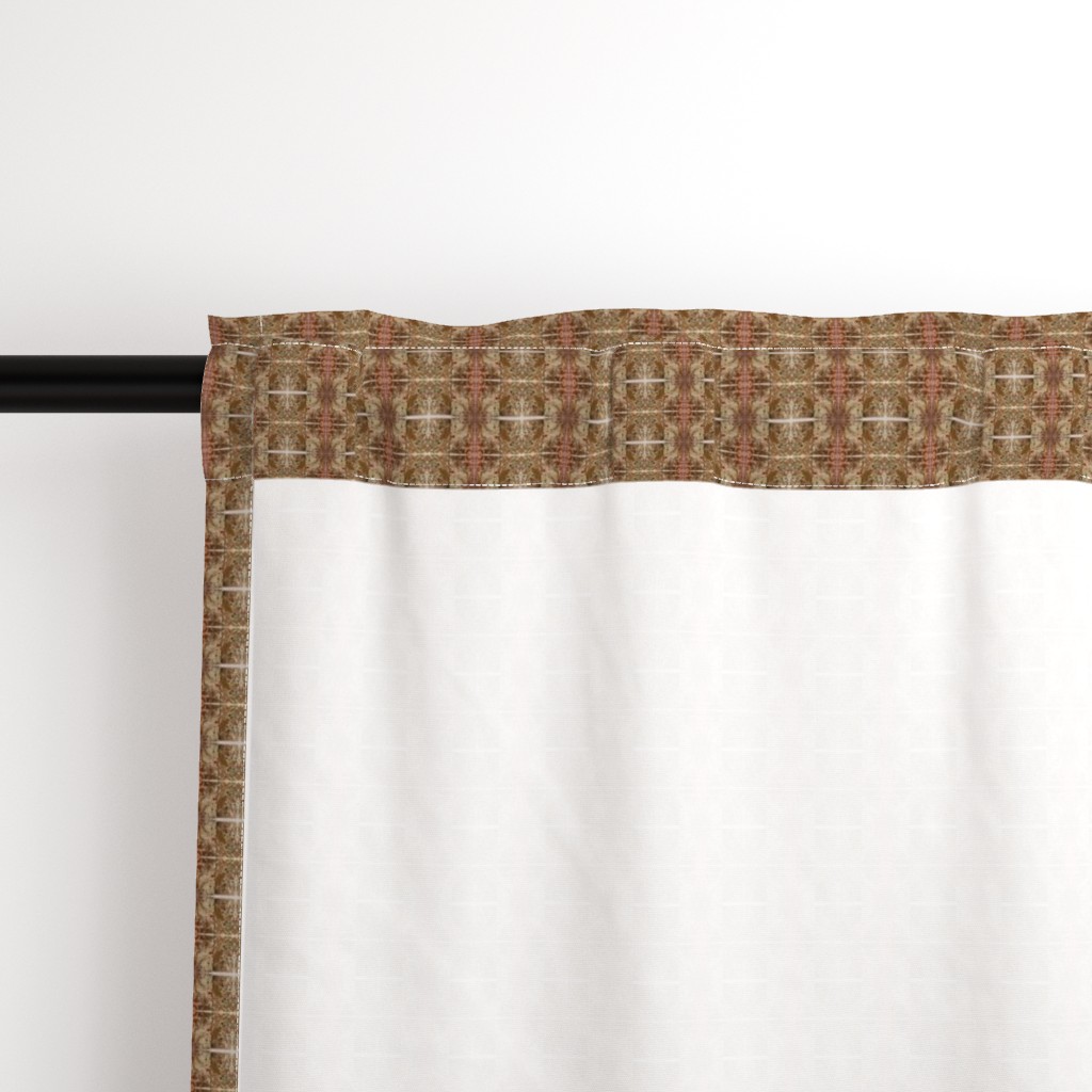 Close up of the back a Curtain panel hanging from a black curtain rod showing the rod pocket hanging option
